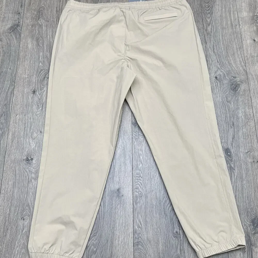 New Balance Jogger Pants Size 2XL Mens Stoneware Beige Athletic Stretch Woven